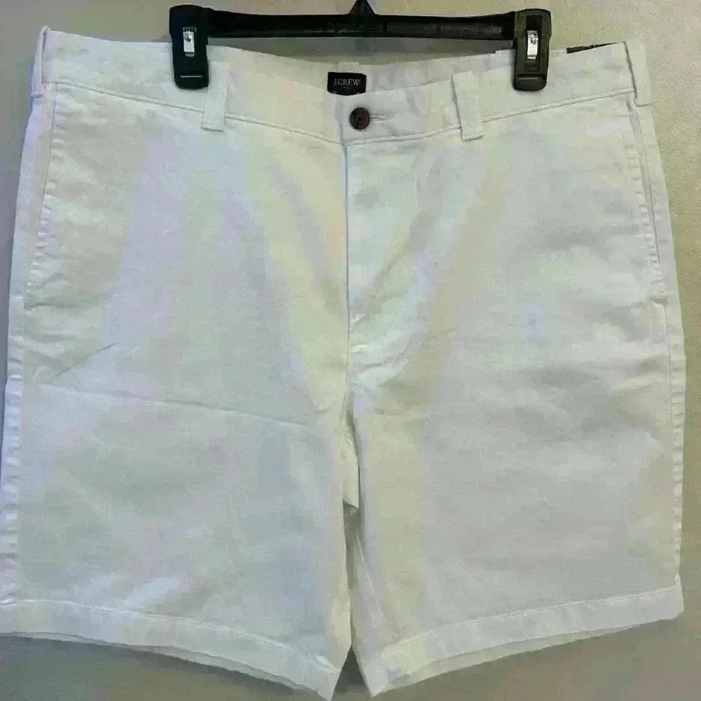 Men's JCrew white flat front shorts.  Size 38 with a 9inch inseam. NWT